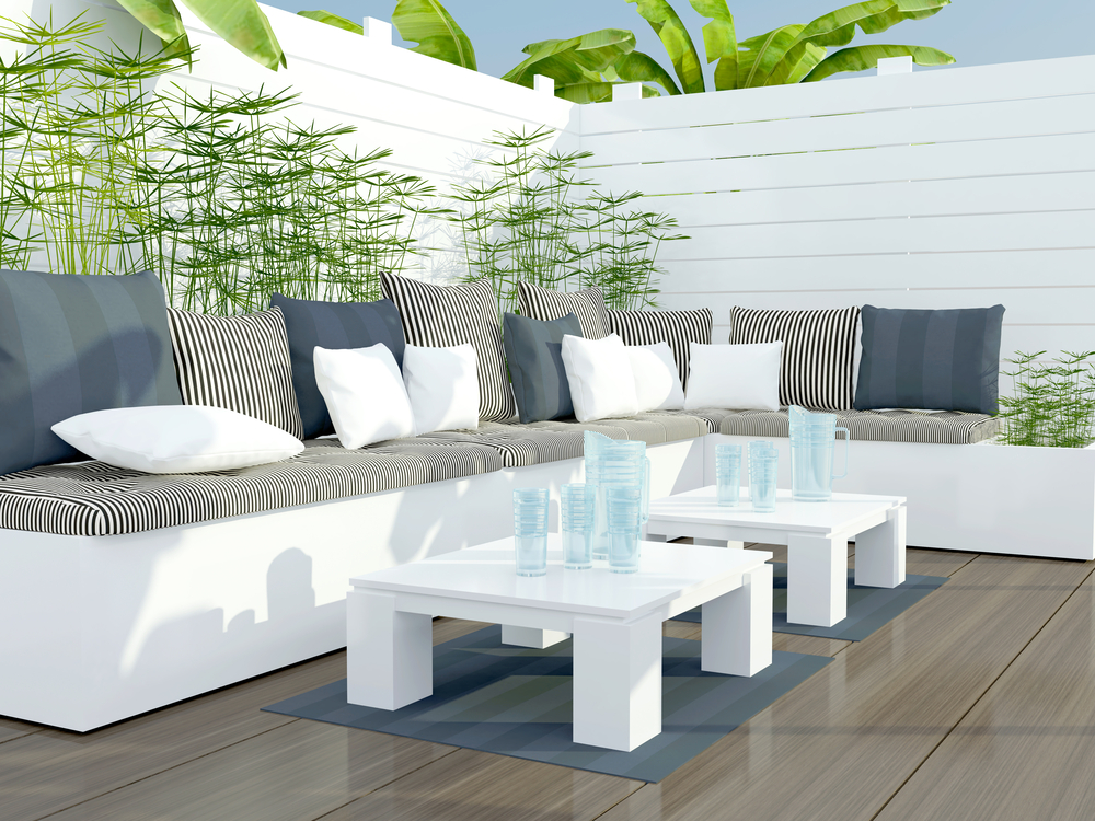 Outdoor,Patio,Seating,Area,With,Big,White,And,Black,Sofa